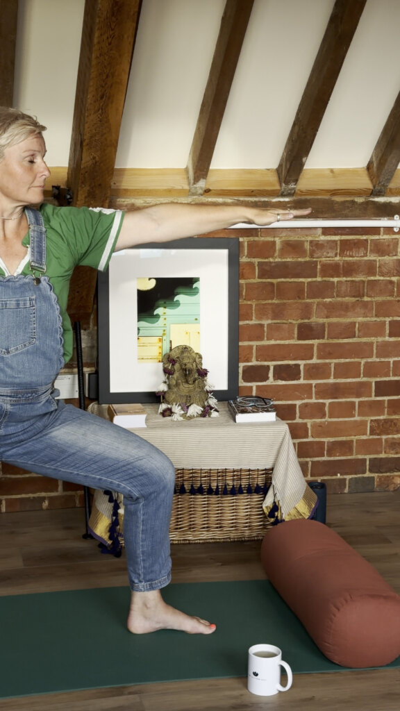 Clare practising warrior two in the Bayfield Brecks studio